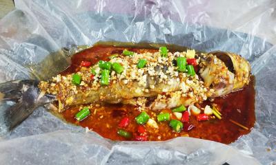  成都特色餐飲培訓學校，哪里可以學正宗紙包魚技術培訓？